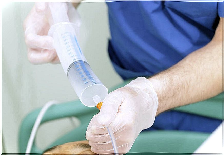 Doctor placing a gastric tube