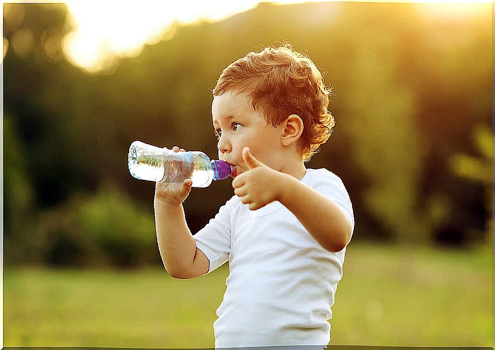 Child drinking water.