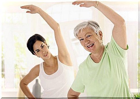 older woman with personal trainer